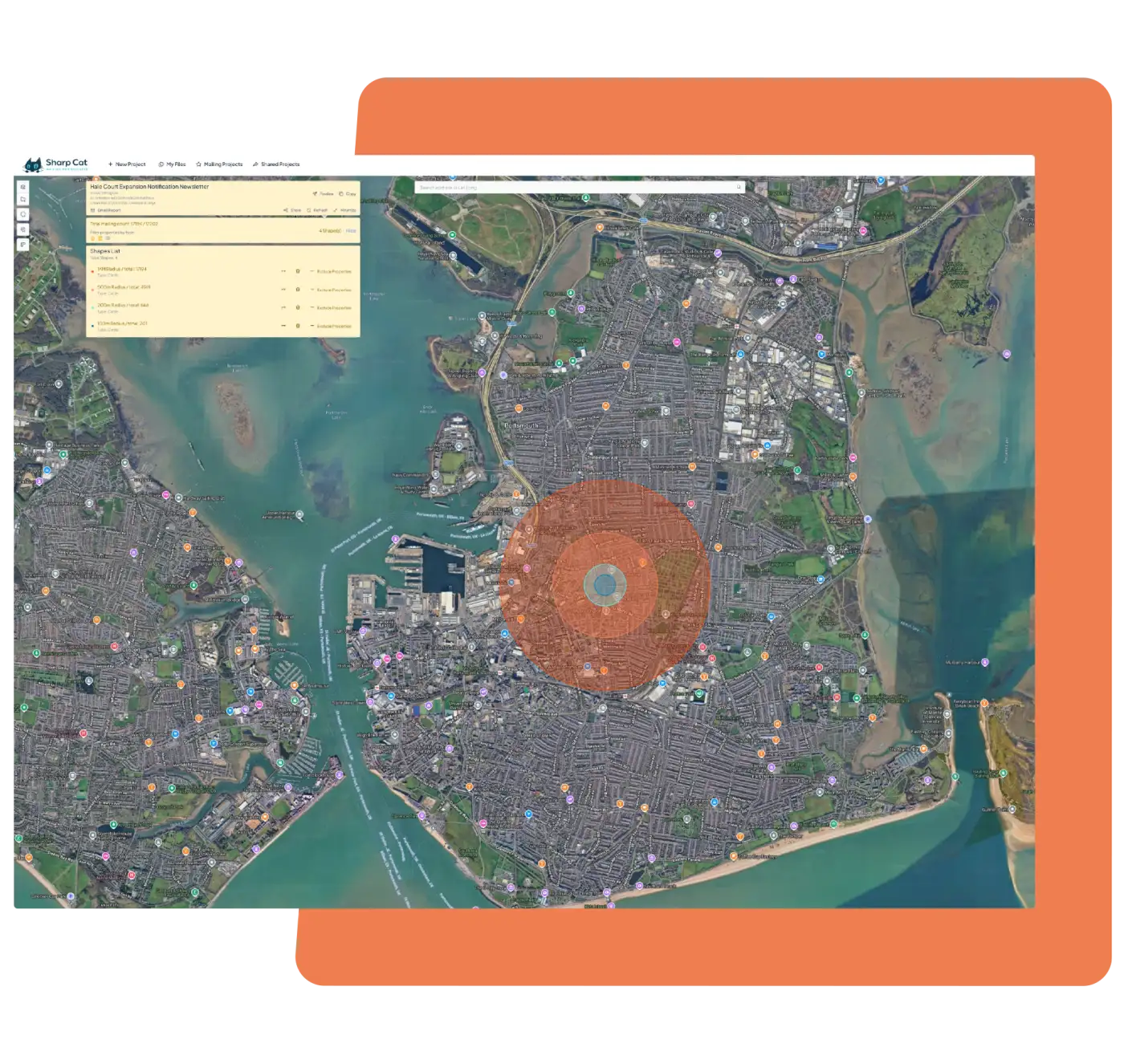 Aerial map view of a coastal urban area with an orange circular zone highlighted in the center, surrounded by various.